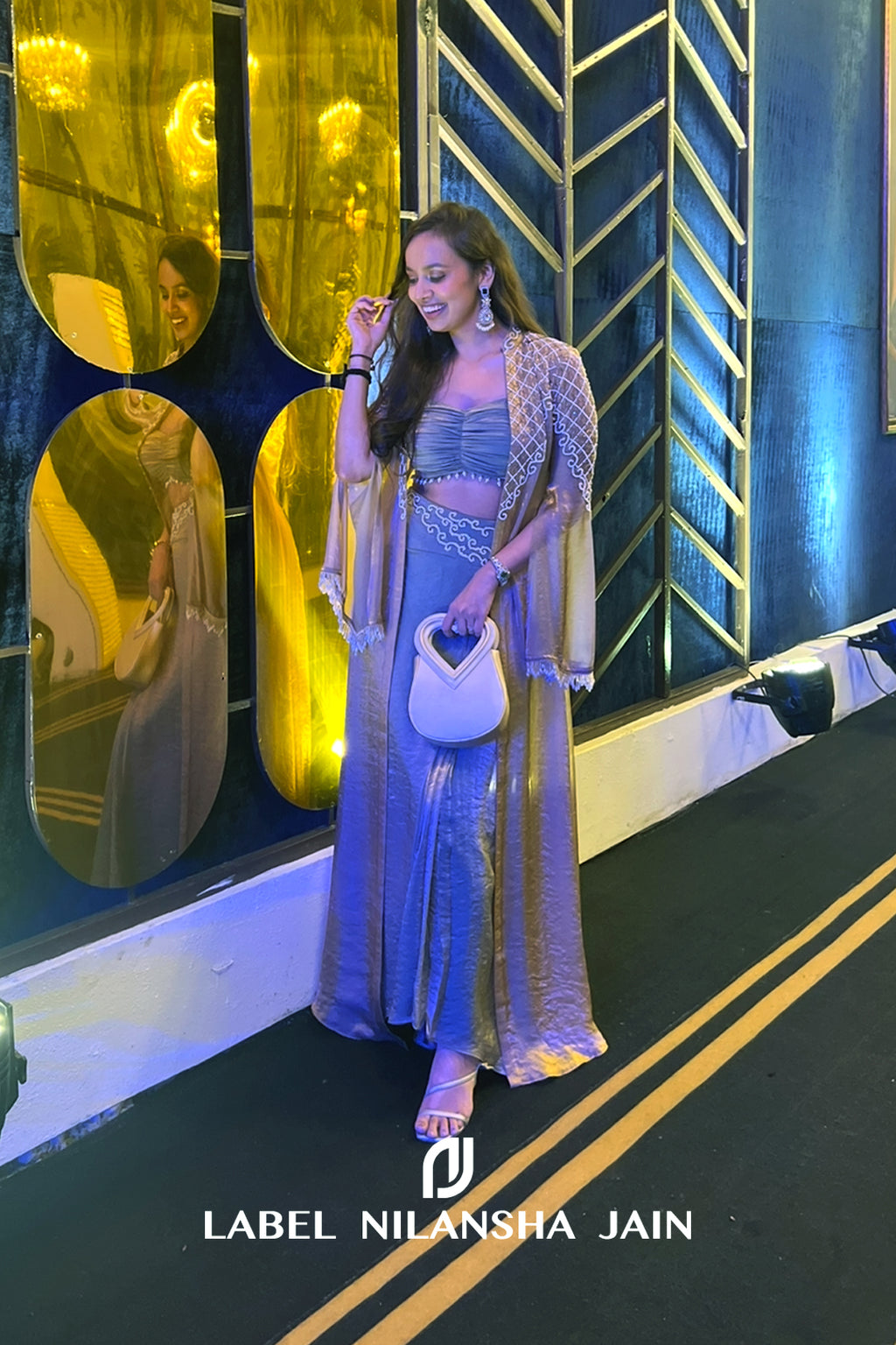 NJ in our Mrinali Cape Set