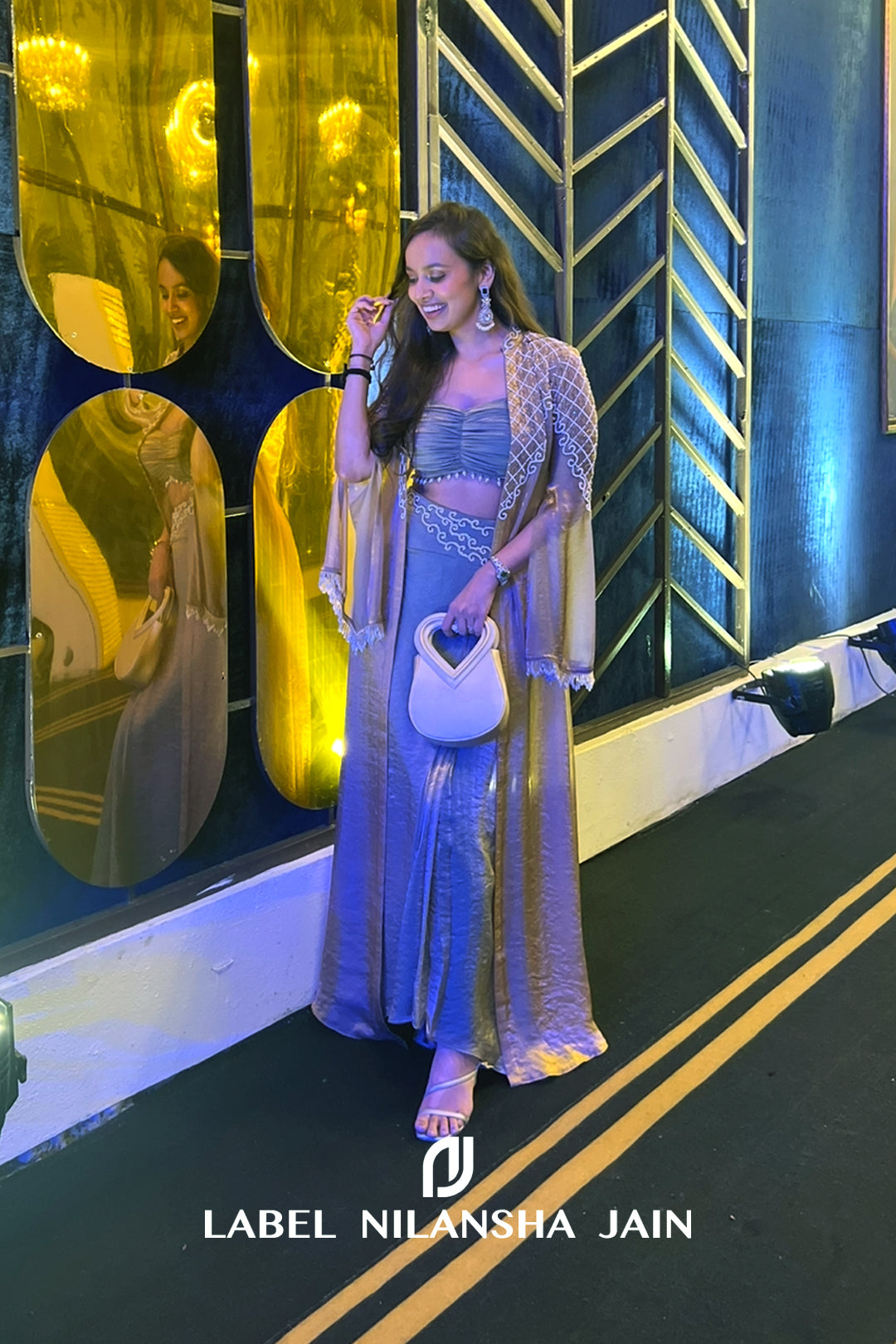 NJ in our Mrinali Cape Set