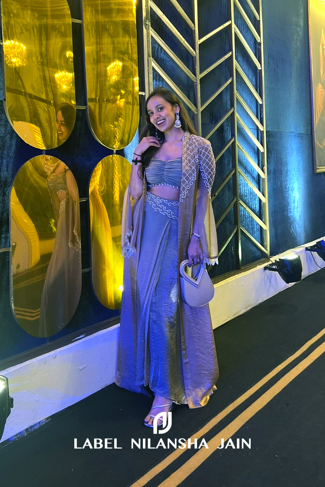 NJ in our Mrinali Cape Set